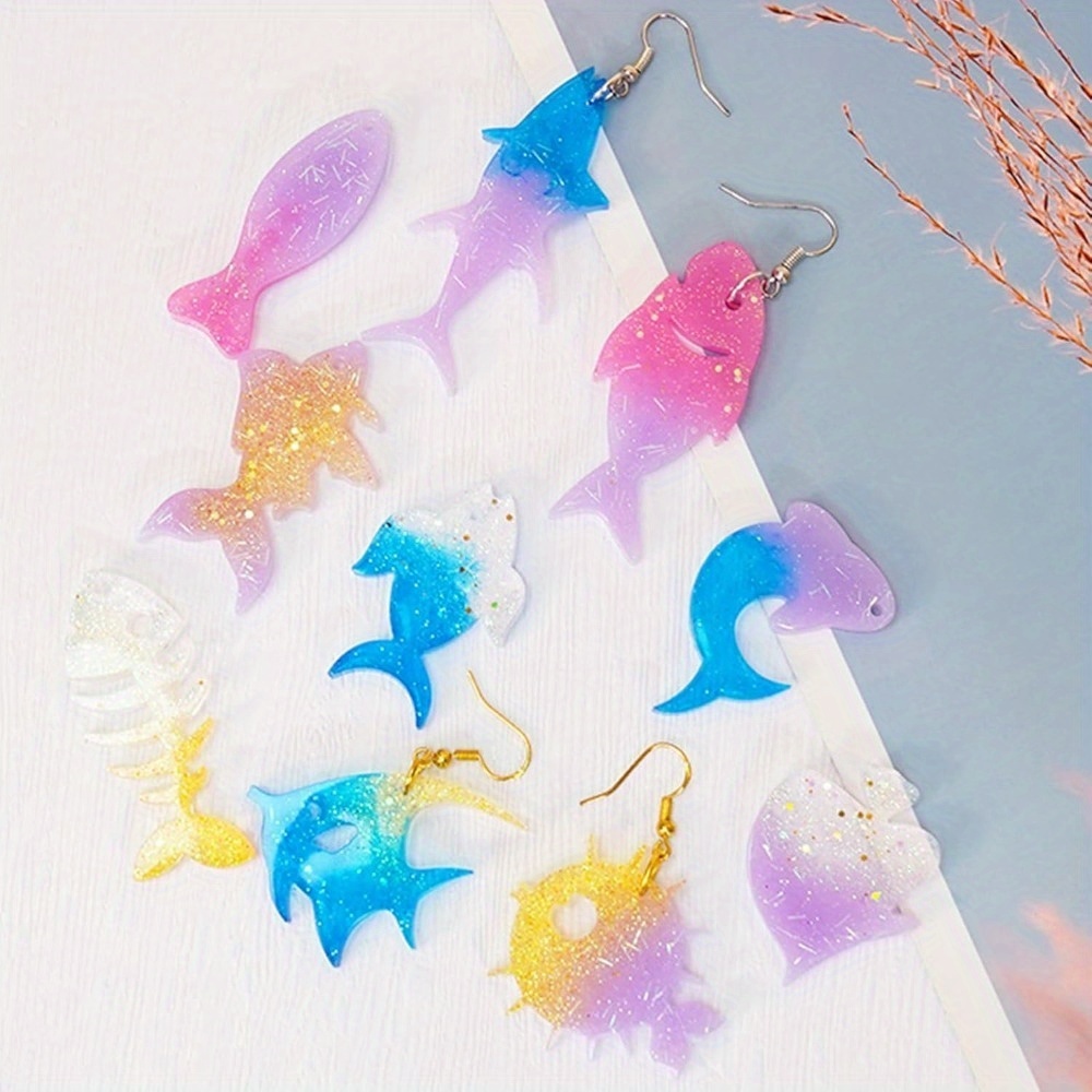海をテーマにしたイヤリングとペンダントの型セットには、魚の尾 - Marine Aquarium & Regional Centre Reviews のレビューと価格